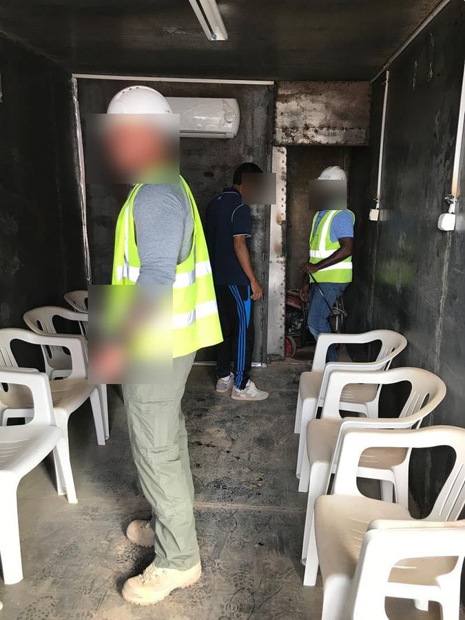 Site team in hard hats and hi-vis
