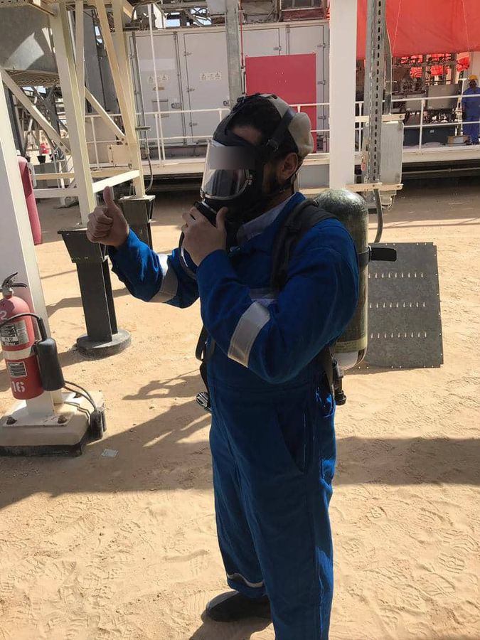 Safety training: mask fitted, thumbs up