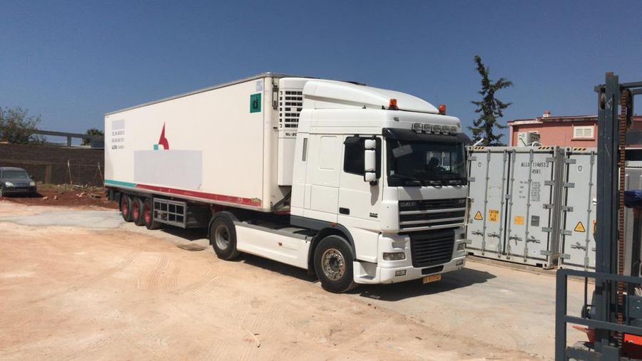 Refrigerated truck in the container yard