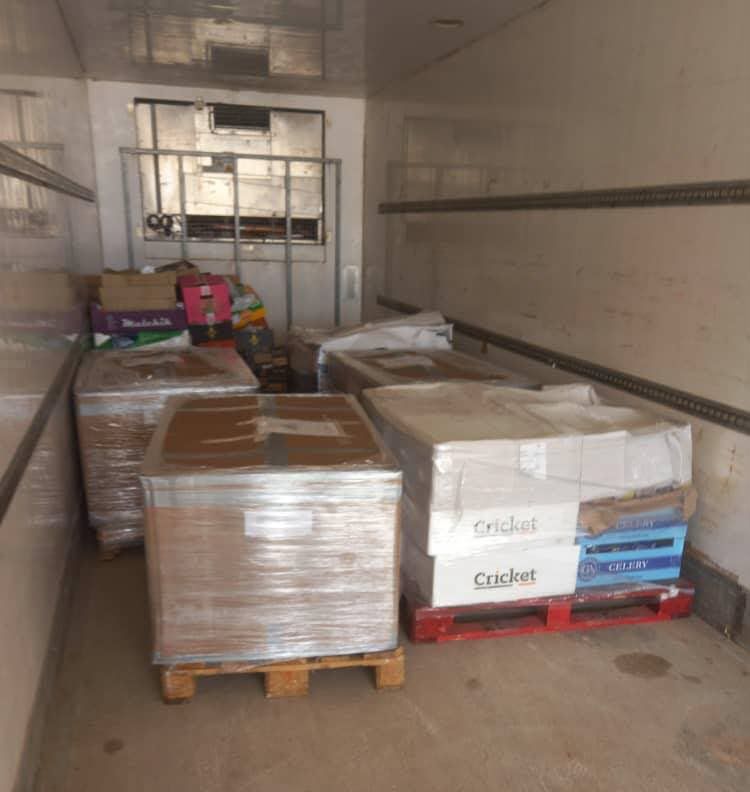 Produce pallets stowed in the trailer
